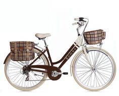 a brown and white bicycle with a basket