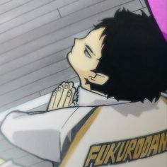 an anime character with black hair and white shirt holding his hands up to his chest