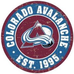 the colorado avalanche logo is shown in red, white and blue on an old - fashioned metal sign