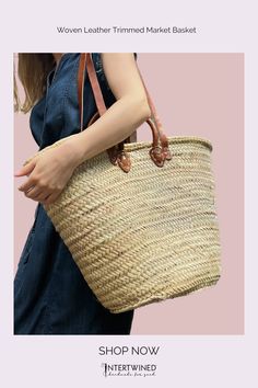 Fall in love with our handwoven market basket! Made by Moroccan artisans, this beautiful basket features soft leather trim and an 8" x 7" interior leather pocket to keep your essentials secure. It comes with both padded handles and shoulder straps, offering versatile carrying options. With ample space, this basket is perfect for everyday use as an oversized purse, beach bag, market tote, or kids' toy storage. Endless possibilities await with this must-have accessory! Casual Handwoven Leather Straw Bag, Leather Bucket Straw Bag For Market, Handmade Leather Straw Bag For Summer, Artisan Straw Basket Bag With Open Weave, Artisan Woven Straw Bag For Everyday, Everyday Woven Leather Straw Basket Bag, Artisan Open Weave Straw Bag For Everyday Use, Artisan Straw Bag For Everyday Use, Handmade Leather Straw Basket Bag