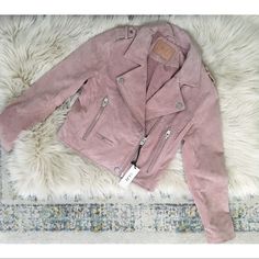 This A A Genuine Leather Suede Moto Styled Jacket In A Mauve-Y Pink With Brushes Silver Hardware. I Purchased This As Is And Haven’t Worn It. This Has Some Wear From The Store But Just Needs A Dry Cleaning- I Was Going To Do That Had I Decided To Keep It But I Thought Not To As To Not Put Even More Money Into Something I’m Not Going To Keep. It’s Beautiful In Shape And Color. Fits True To Size And I’m Happy To Answer Any Questions! Free Gift With Purchase On Top Of My Usual Freebie Offer Pink Leather Jacket With Zipper For Fall, Pink Leather Jacket With Zipper Closure For Fall, Casual Pink Leather Jacket For Fall, Pink Leather Winter Outerwear, Pink Biker Outerwear With Zipper Closure, Trendy Pink Leather Jacket For Spring, Chic Pink Leather Jacket For Fall, Pink Leather Jacket With Zipper Closure And Long Sleeves, Pink Biker Outerwear With Long Sleeves