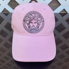 Versace Cap Unisex (Pink With Signature Logo) Size 58 Brand New With Tag, Never Been Worn Bought Directly From The Versace Store Pink Visor Baseball Cap With Embroidered Logo, Pink Snapback Baseball Cap With Embroidered Logo, Trendy Pink Baseball Cap With Embroidered Logo, Pink Baseball Cap With Embroidered Logo, Pink Hat With Embroidered Logo For Streetwear, Pink Embroidered Logo Hat For Streetwear, Pink Streetwear Hats With Embroidered Logo, Trendy Pink Hat With Embroidered Logo, Trendy Pink Trucker Hat With Curved Visor