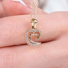 ✥ Celebrate a milestone with our Intertwined Hearts Diamond Necklace, an ideal anniversary gift. This exquisite necklace features two hearts intricately intertwined, symbolizing the deep connection and enduring love between two people. Adorned with sparkling diamonds, it adds brilliance and elegance to any ensemble. Crafted from high-quality materials for lasting beauty and durability, it's perfect for daily wear or special occasions. A heartfelt expression of love and commitment, this necklace is a meaningful and cherished reminder of shared memories and milestones. ✦ Stone Details:✧ Stone Type: Moissanite✧ Stone Cut: Round Cut✧ Stone Total Weight: 0.19CT ✧ Color: DEF✧ Clarity: VVS✧ Make: Hight Quality Craftmanship ✦ Metal Details✧ Metal Type: Solid Gold✧ Metal Purity: Available Options:1 Enduring Love, Intertwined Hearts, Charles And Colvard Moissanite, Heart Necklace Diamond, Deep Connection, Jewelry Images, Rose Gold Metal, Two Hearts, Designer Engagement Rings