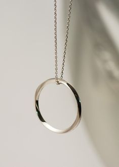 This collection is designed around a square wire that turns on itself, celebrates the curved lines that spin into the light. 950/1000 ième silver silver pendant. average weight 4 grams can be made in a brushed version diameter 3.1 cm Chain is  included in the price.  any questions or want to see more pictures, convo me! Modern Silver Pendant Jewelry, Modern Sterling Silver Jewelry With Shiny Finish, Modern White Gold Oval Pendant Jewelry, Modern Sterling Silver Oval Pendant Jewelry, Modern Silver Chain Pendant Jewelry, Modern Silver Pendant Chain Jewelry, Modern Twist Sterling Silver Jewelry In White Gold, Modern White Gold Square Pendant Jewelry, Modern Silver Oval Pendant Jewelry