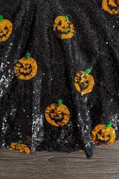 *Please refer to size chart for the best fit* Perfect for Spooky Season Dress features an allover sequin Jack-O'-Lantern design Pull-over style with back zipper for easy dressing Short sleeve design makes it easy to layer Bring on spooky season with this Black Sequin Jack-O'-Lantern Dress. This girls' short sleeve dress features an allover black sequin Jack-O'-Lantern design, making it a staple addition to her Halloween wardrobe. The breathable fabric makes for cool and comfy wear, while the sequins add a fun touch. She can pair this dress with a pair of booties or a matching bow for the perfect look! bullets:Includes: Dress only 95% Polyester, 5% Spandex Lantern Dress, Short Sleeve Design, Comfy Wear, Lantern Design, Easy Dressing, Short Sleeve Dress, Jack O, Black Sequins, Sleeve Designs