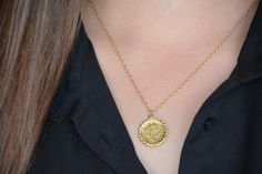 Gold coin necklace, gold coin pendant, coin necklace, antique necklace, delicate gold necklace, everyday gold necklace, bridesmaid necklace Delicate gold necklace with an old british gold coin pendant, great for everyday wear, unique and beautiful. The gold coin necklace is made of 14k gold filled and the gold pendant is an original coin which I decorate with twisted brass wires and plated with 14k gold. The coin necklace is also available in sterling silver. Dimensions: The coin pendant's diame Dainty Coin Pendant Necklace, Gold Plated Dainty Medallion Necklace, Dainty Gold Plated Medallion Coin Necklace, Yellow Gold Brass Coin Necklace With Delicate Chain, Dainty Brass Charm Necklace With Coin Pendant, Elegant Coin Shaped Locket Necklace, Elegant Coin-shaped Locket Necklace, Dainty Yellow Gold Coin Pendant Necklace, Dainty Brass Necklace With Coin Pendant