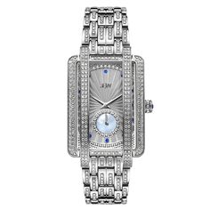 The eccentrically classic Mink gets the Platinum treatment with 505 genuine diamonds individually set on the bezel, dial, case, crown, and bracelet, totaling 2.53 carats. The feminine design reaches new heights of elegance with diamond-covered lugs sweeping over the crystal face, 13 genuine blue sapphires marking the hours on a fan-texture dial, one large radiant sapphire set on the crown, and a mother-of-pearl sub dial. A limited edition heirloom, the Mink PS is crafted in durable rhodium plate Diamond Watches Women, Watch Dial, The Hours, Electronic Gifts, Women Diamond, Cool Tones, Diamond Watch, Stainless Steel Band, Steel Watch