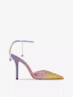 Who said sparkling jewels were only for your ears, neck and wrists? Jimmy Choo adorns the Saeda 100 courts with glittering gems by swapping a traditional ankle strap for a crystal-embellished chain that work its way down the back of the ankle. Keeping the rest of the style’s construction simple, the London-based shoemaker crafts the pointed-toe silhouette from soft satin and sits them on a sculptural curved heel. Dreamy. Jimmy Choo Saeda, Satin Heels, Ankle Bracelets, Dream Shoes, Jimmy Choo, Ankle Strap, Satin, Chain, Heels