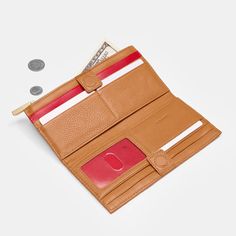 You can't cruise through DTLA without the 110 North. That's why we named our essential folding wallet after LA's fan-favorite freeway. This organizer's dream features 10 credit card slots, a transparent ID pocket, zippered pocket and two drop pockets to hold cash. Creativity and wearability collide in a true masterpiece: Meet our new Artist Tape collection. Our design team accented warm, saturated brown leather with a striking duo of crisp pink stripes. Meticulously straight, as if brought to li Gold Wallet, Heeled Mules Sandals, Fold Wallet, Lunch Tote, Shoe Gifts, Pink Stripes, Everyday Bag, Cuff Earrings, Leather Care