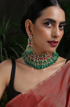 A beautifully handcrafted neckpiece worked in gold, finished with an array of semi-precious gemstone drops and encrusted with kundan. This choker set is based in silver alloy plated with 22k gold. Necklace Closure - Adjustable Dori Earrings Closure - Push Back Necklace - 14 inches Earrings - 3.5 inches Style Tip - A perfect choker for someone who's styling decisions always start and end with putting timeless classics together to create a magical and unique look. An accessory so versatile, we are Festive Temple Jewelry Necklaces With Stones, Kundan Multi-stone Necklace As Gift, Traditional Festive Necklaces With Stones, Elegant Multi-stone Necklace For Diwali, Fusion Style Festive Necklaces With Stones, Festive Stone Necklaces, Festive Necklaces With Stones, Fusion Kundan Necklaces With Stones, Festive Kundan Necklaces With Stones