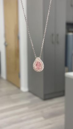 Natural pink pear shape diamond pendant necklace, surrounded by a white diamond double halo Pink Diamond Necklace, Rare Diamond, Cute Engagement Rings, Jewelry Accessories Ideas, Double Halo, Shiny Things, Pear Shaped Diamond, Pear Diamond, Diamond Pendant Necklace