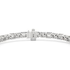 Versatile enough for every occasion and season, this diamond tennis bracelet pairs effortlessly when dressed up or down. It has the seamless blend of effortless elegance and timeless style with its combination of cushion diamonds on v-prongs and emerald-cut diamonds on bezels. Classic Tennis Bracelet With Baguette Cut, Formal Cubic Zirconia Tennis Bracelet With Rectangular Links, Anniversary Diamond Bracelet With Rectangular Links, Classic Diamond Bracelet With Rectangular Links, Timeless Tennis Bracelet With Diamond Accents And Baguette Cut, Modern Diamond Tennis Bracelet With Baguette Cut, Modern Baguette Cut Tennis Bracelet For Anniversary, Classic Baguette Cut Tennis Bracelet, Diamond Tennis Bracelet With Rectangular Links And Diamond Accents