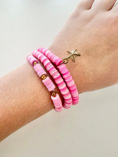 Preppy pink is a bracelet collection are perfect for pink lovers! All bracelets are pink with some a little bit of gold. Trendy Pink Heishi Beads Stretch Bracelet, Pink Heishi Beads Colorful Beaded Bracelets, Pink Heishi Beads Bracelets With Colorful Beads, Pink Heishi Beaded Bracelets With Colorful Beads, Pink Heishi Beads Bracelet With Colorful Beads, Trendy Pink Heishi Beads Friendship Bracelet, Pink Heishi Beads Bracelet, Handmade Pink Heishi Beads Stretch Bracelet, Pink Heishi Beads Friendship Bracelets For Beach