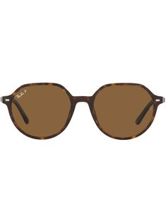 Brown Thalia round frame sunglasses from RAY-BAN featuring tortoiseshell effect, round frame, brown tinted lenses and curved tips. Protect your investment. This piece comes complete with a protective dust bag.. | Ray-Ban Thalia round frame sunglasses Ray Ban Round, Ray Ban Round Sunglasses, Round Frame Sunglasses, Round Frame, Ray Ban Sunglasses, Sunglass Frames, Tortoise Shell, Ray Ban, Sunglasses Accessories