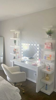 a bedroom with a vanity and chair in it