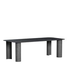 a black table sitting on top of a white floor