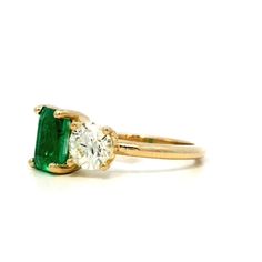 Crafted from 14 karat yellow gold, this ring features an emerald cut emerald along side a round brilliant cut diamond. The emerald has a total carat weight of 1.39 while the diamond is .78 carats. The stones are set in toi et moi design and along with the 14k yellow gold provide a gorgeous mix of color, contrast and sparkle. This unique ring is versatile and can be worn everyday or as a sometimes ring. Ring With Emerald, Platinum Rose Gold, Sapphire Solitaire, Unique Ring, Shop Engagement Rings, Color Contrast, Emerald Diamond, Mens Wedding Bands, Round Brilliant Cut Diamond