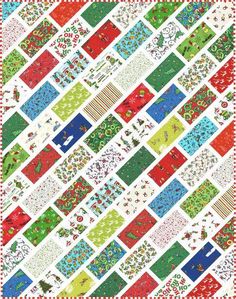 a colorful quilt with many different designs on it