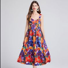 Style: Boho & Vacation,Elegant Fit: Regular Fabric: Polyester Pattern: Floral Element: Non Neckline: V-Neck Sleeve Type: Others Sleeve Length: Sleeveless Product Type: A Line Dress Occasion: Vacation,Daily Dress/Skirt Length: Midi Main Composition: Polyester Season: Summer Elegant Sleeveless Floral Print V-neck Dress, Elegant Sleeveless Multicolor Midi Dress, Elegant Floral Print Sundress With V-neck, Elegant Multicolor Midi Sleeveless Dress, Summer Sleeveless Floral Print V-neck Dress, Floral Print Sleeveless V-neck Summer Dress, Red Floral Print V-neck Sleeveless Dress, Sleeveless Floral Print V-neck Dress For Party, Elegant Multicolor Sleeveless Beach Dress