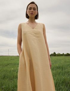 Introducing our stunning long maxi dress with puffed sleeves. It's double sided with pearl button, oversized fit in perfect forest green shade 100% stonewashed linen  OEKO-tex standard 100 certified  We have linen dresses in two sizes - S-M and M-L, but we are happy to make additional sizes for you. XS-S Bust - 31.5 - 34.6 inches (80-88 cm) Waist - 25.4 - 28.3 inches (64.5-72 cm) Hips - 34.6 - 38.2  inches (88-97 cm) M-L Bust - 34.6 - 38.2  inches (88-97 cm) Waist - 28.3 - 31.8 inches (72-81 cm) Hips - 38.1 - 41.3 inches (97-105 cm) DETAILS 100% linen dress Decorative cotton ribbons  Model Measurements - bust (87 cm - 34.2"), waist (65 cm - 25.5"), hips (91 cm - 35.8"). Model wears XS-S SHIPPING AND DELIVERY All orders are sewed in our workshop. They are packed and shipped within the shop' Spring Linen Unlined Dresses, Spring Linen Dress Unlined, Unlined Linen Midi Dress, Unlined Linen Sundress Maxi Dress, Linen Sundress In Maxi Length, Beige Linen A-line Maxi Dress, Beige A-line Linen Maxi Dress, Beige Linen Sundress For Daywear, Beige Unlined Dress For Daywear