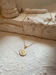 Truly Blessed Jewels - Benito Necklace White Tarnish Resistant Necklace With Initial Pendant, White Tarnish Resistant Initial Pendant Necklace, White Medallion Necklace, White Tarnish-resistant Initial Pendant Necklace, Gold Plated Medallion Necklace With Pearl Pendant, Yellow Gold Medallion Necklaces With Pearl Charm, Gold Plated White Coin Pendant Jewelry, White Coin Pendant Jewelry As Gift, White Coin Pendant Jewelry For Gift