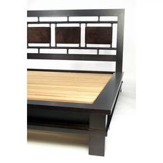 a bed frame with wooden slats on it