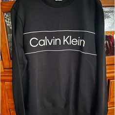 Brand New Black Calvin Klein Fleece Sweatshirt Size L In Men’s Got This As A Holiday Gift But Didn’t Fit Me Let Me Know If You Have Any Questions Calvin Klein Logo Print Sweatshirt For Fall, Calvin Klein Crew Neck Sweatshirt With Ribbed Cuffs, Calvin Klein Crew Neck Winter Sweatshirt, Calvin Klein Crew Neck Sweatshirt For Winter, Calvin Klein Winter Sweatshirt With Ribbed Cuffs, Calvin Klein Long Sleeve Sweatshirt With Logo Print, Calvin Klein Casual Crew Neck Sweater, Calvin Klein Long Sleeve Logo Print Tops, Casual Calvin Klein Crew Neck Sweater