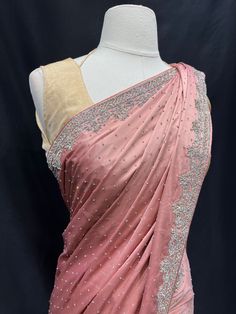 Enhance your elegance with our Party Wear Saree D-194. This luxurious saree is adorned with exquisite stone work, adding a touch of glamour to your attire. Elevate your style and make a statement with this beautiful piece. Stone Work Saree Party Wear, Luxury Pink Party Wear Pre-draped Saree, Stone Work Saree, Work Sarees Party Wear, Party Wear Pre-draped Saree With Pearl Embroidery For Diwali, Party Silk Pre-draped Saree With Pearl Embroidery, Glamorous Pink Pre-draped Saree With Zari Work, Elegant Pink Pre-draped Saree With Intricate Embroidery, Green Street