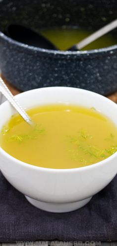 a bowl of soup with a spoon in it