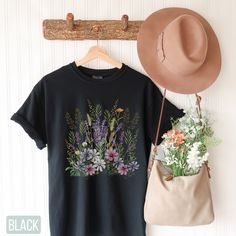 "Vintage Botanical Shirt, Wildflower Tee, Botanical Shirt, Gardening Floral t shirts, Boho Shirt Floral T shirt, Bohemian Shirts, Plant Shirt, Fern Botanical Cottagecore Shirt, Comfort Color, Wildflowers Shirt, Gardener Shirt, Nature Lover Gift for Her, Vera Fern, Forest Plant Shirt, Forest Graphic Tee, Nature Lover Gift, Ferns, Mushroom Shirt, Forester Shirt, Botanical Tshirt, Gardening Shirt, Plant Shirt, Wildflowers Shirt, Comfort Colors® Poppies T Shirt, Watercolor Poppy Flowers Shirt, Wildf Cottagecore Floral Embroidery T-shirt For Summer, Cottagecore Embroidered Cotton Top, Cotton Cottagecore Top With Embroidery, Botanical Style T-shirt With Floral Embroidery, Botanical Style Short Sleeve T-shirt With Floral Embroidery, Botanical Short Sleeve T-shirt With Floral Embroidery, Cottagecore Floral Embroidered T-shirt For Summer, Bohemian Spring T-shirt With Floral Embroidery, Bohemian Spring Shirt With Plants Print