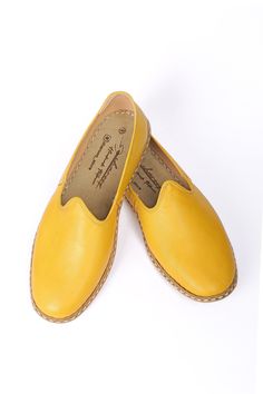 These canary yellow 100% handcrafted shoes, made from high-quality natural leather, will make you feel comfortable. Our authentic loafers, crafted with amazing craftsmanship, are not only a great gift for friends and family but also for yourself. The superior stitching style we use takes more time but reflects the quality we are proud of. Our traditional shoes are suitable for wearing both inside and outside. Wanna see more Charooq for men? Check out the link! https://www.etsy.com/your/shops/Cha Yellow Flats With Leather Sole And Round Toe, Yellow Round Toe Flats With Leather Sole, Yellow Leather Slip-ons, Yellow Slip-ons With Rubber Sole, Yellow Slip-ons With Round Toe, Casual Yellow Leather Slip-ons, Yellow Leather Slip-on Loafers, Yellow Leather Slip-ons With Round Toe, Yellow Moccasins With Rubber Sole And Round Toe