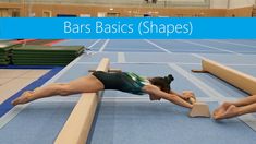 two girls are doing gymnastics exercises on parallel bars in an indoor gym with the words bars basics shapes