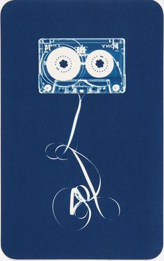 a blue book with an audio cassette on it's cover and eyeballs in the background