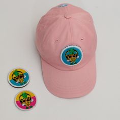 The Details Tropical Summer 2021 Tropical rhythm interchangeable velcro patch logo on front One size fits all Adjustable strap with buckle Precurved bill AnotherThreadClothingCo. spool logo on rear Material(s) 97% Cotton || 3% Polyester Casual Logo Patch For Streetwear, Casual Pink Hats With Logo Patch, Velcro Patches, Tropical Summer, Car Coat, Dad Hats, One Size Fits All, Patch Logo, Baseball Cap