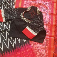 Create everyday staples that are both timeless and practical with this black Pochampally Ikkat handloom pattu saree. This is suitable for pretty much every occasion. It comes with a blouse fabric. Product : Saree Material : PochamPally Ikkat Pattu Color : Black,Dark Pinkish Red Pico & Fall : Yes Blouse Fabric : Yes  Do Note : Saree And Blouse can purchased Separately  Blouses are designed in-house from SumasEthnicWear  Care : Hand wash separately | line dry in shade | warm Iron Note: Minor colou Red Pattu Saree, Ikkat Motifs, Saree Material, Double Knot, Pinkish Red, Red Saree, Pattu Saree, Wedding Saree, Blouse Material