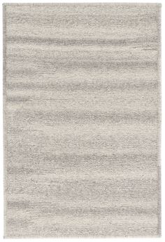 an area rug with grey and white stripes