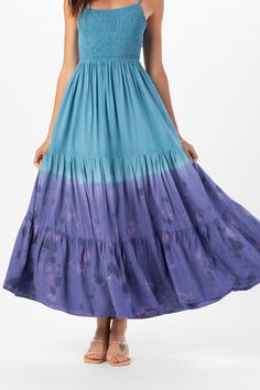 With its floor-grazing length, the Avisa Maxi Dress exudes bohemian elegance, making it perfect for everything from beach weddings to summer soirées. Whether you're dancing under the stars or strolling along the shore, this dress is sure to make you feel like a goddess. Details: 100% Rayon Hand Wash in Cold Water and Lay Flat to Dry Features: Unlined, Smocked Bodice, Self-tie spaghetti strap closure, Tassel tie detail on straps, Open back detail for an adjustable fit, Tiered Maxi Skirt. Measurem Bohemian Tiered Maxi Dress, Bohemian Tiered Boho Dress For Beach, Festival Tiered Skirt Dress, Bohemian Flowy Tiered Maxi Dress, Bohemian Tiered Boho Dress For Vacation, Summer Bohemian Tiered Boho Dress, Bohemian Tiered Beach Dresses, Summer Tiered Bohemian Boho Dress, Flowy Tiered Bohemian Boho Dress