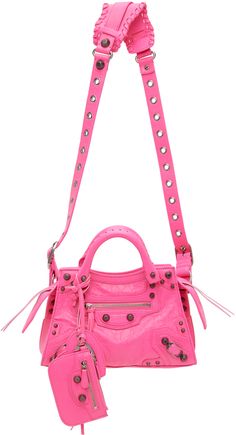 Crinkled leather top handle bag in pink. Studded detailing and pin-buckle hardware throughout. · Whipstitching at twin carry handles · Adjustable and detachable shoulder strap · Detachable zip pouch and mirror · Zip pocket at face · Zip closure · Zip pocket at interior · Cotton plain-woven lining · H7 x W9 x D4.5 in Supplier color: Fluo pink Pink Woven Shoulder Bag, Balenciaga Clothing, Chloe Brown, Fashion Design Inspiration, Outfit Collage, Fashion Inspiration Design, Pretty Bags, Virtual Closet, Zip Pouch