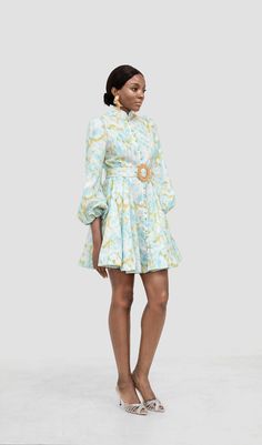 Elevate your style with our Kellee Aqua Floral Long Sleeve Mini Dress. featuring charming lantern sleeves and a flattering belt. This dress is a harmonious blend of elegance and playfulness. adorned with a delightful floral pattern. The lantern sleeves add a touch of whimsy. while the included belt enhances the figure for a chic and versatile look. beltlantern sleevedry cleanItem measurements have been rounded to the nearest cm.This garment fits true to sizeModel is 5'9.5"/178 cm. bust 32''/82cm Spring Long Sleeve Dresses With Belt, Spring Long Sleeve Belted Dress, Spring Puff Sleeve Belted Dress For Daywear, Belted Long Sleeve Dress For Garden Party, Long Sleeve Belted Dress For Garden Party, Spring Belted Dress With Puff Sleeves, Spring Puff Sleeve Belted Dress, Spring Belted Mini Dress With Puff Sleeves, Spring Puff Sleeve Belted Mini Dress