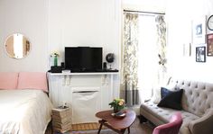 a living room filled with furniture and a flat screen tv