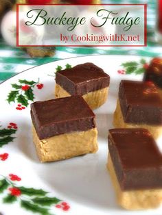 three pieces of cake sitting on top of a white and green plate with holly decorations