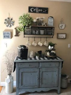 the coffee bar is decorated with pots and mugs