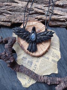 Necklace raven black, Pendant crow labradorite Personalization can be done on the back of the pendant (any name). Please let me know your wishes. The size of the pendant is 2.16x3.74 inches. I will adjust the length of the cord according to your request This magical and charming pendant is molded of professional polymer with black obsidian. Black obsidian is a stone with magical properties This pendant is the only one. It is filled with magic and made with great love. It is very lightweight and Black Labradorite Pendant Necklace, Crow Necklace, Raven Necklace, Crystal Necklaces, Fantasy Creatures Art, Black Pendant, Black Obsidian, Polymer Clay Art, Nature Jewelry