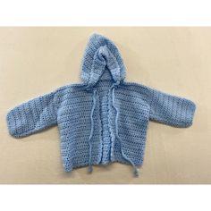 Hand Knitted Baby Boys Open Hooded Cardigan Sweater Long Sleeve Blue No Size Or Material Tag New Unworn Measures 12" From Back Collar To Bottom Hem Measures 10" From Armpit To Armpit Measures 10" From Collar Seam To End Of Sleeve Cuff Blue Hooded Winter Cardigan, Light Blue Knitted Cotton Sweater, Cute Blue Sweater For Playtime, Blue Cozy Warm Sweater, Cute Blue Knit Cardigan, Blue Long Sleeve Sweater For Playtime, Blue Cotton Knit Cardigan, Blue Hand-knitted Winter Outerwear, Blue Hand Knitted Winter Outerwear