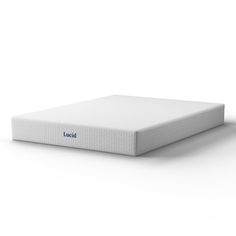 the lucd mattress is made from foam and has blue lettering on it's side