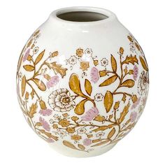 a white vase with gold and pink flowers painted on the outside, sitting against a white background