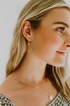 Our Starburst Pendant Huggie Earrings are the perfect minimalist earrings! Made with 14K Gold Filled findings, nickle and lead free. These simple earrings are a beautiful staple piece! Delicate Gold Huggie Earrings With Ear Wire, Everyday Gold Teardrop Jewelry, Everyday Rose Gold Jewelry With Matching Earrings, 14k Gold Filled Earrings For Everyday Fine Jewelry, Dainty Gold Earrings For Everyday, Dainty Gold Teardrop Huggie Earrings, Starburst Pendant, Huggie Earrings, Simple Earrings