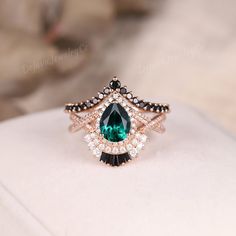 Unique Pear Cut Emerald Engagement Ring Set Black Onyx Wedding Ring Set Women Solid Rose Gold Bridal Set May Birthstone Jewelry Gift For Her ✦ Handmade, high-quality item ✦ Material: SOLID 10K/14K/18K GOLD ( can be made in yellow/white/rose gold ) ✦Engagement ring ✦ Center stone: Lab emerald ✦ Size/Weight: 6*8mm ✦ Color: Green ✦ Cut: Pear Shaped ✦ Side stones: Moissanite ✦ Weight: About 0.51ct  ✦ Color: DEF Color ✦ Or Side stones Diamond: 0.51ct ✦ Band Width: Around 1.6mm ✦Wedding band ✦ Side st Onyx And Emerald Engagement Ring, Emerald And Black Diamond Ring, Green And Black Engagement Ring, Onyx Wedding Ring, 6mm Wedding Band, Rose Gold Bridal Set, Emerald Engagement Ring Set, Gold Bridal Set, Onyx Colour