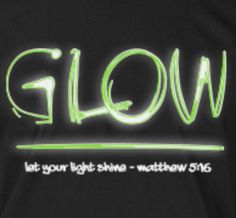 the glow t - shirt is black with green lettering