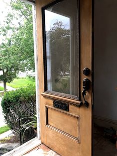 an open door with a glass pane on the front and side panels to it